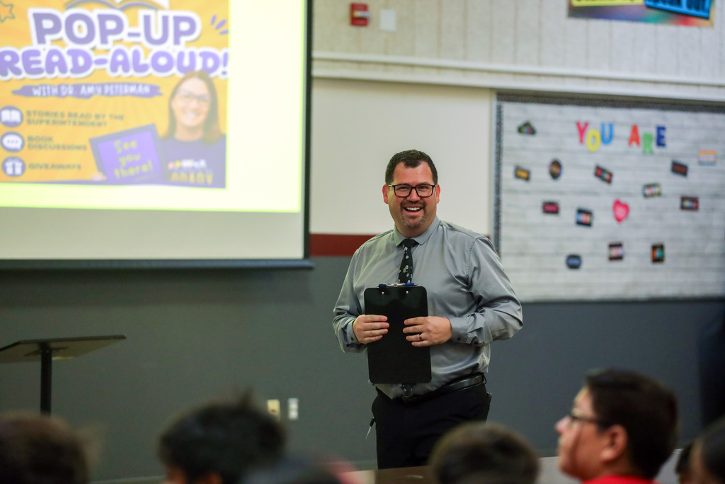 Principal Maldonado speaking to assembled students