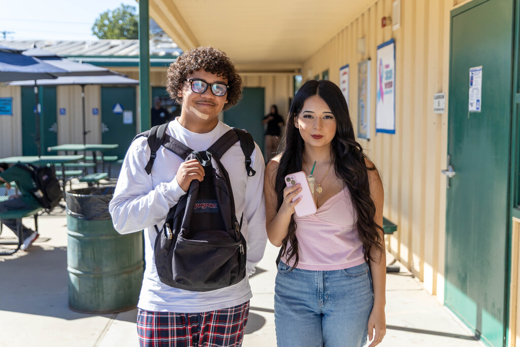 two students smiling