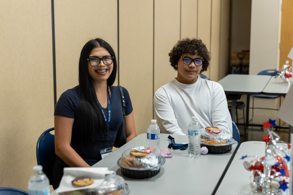 two students sitting at a table
