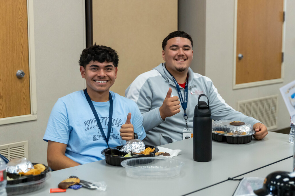 two students sitting at a table