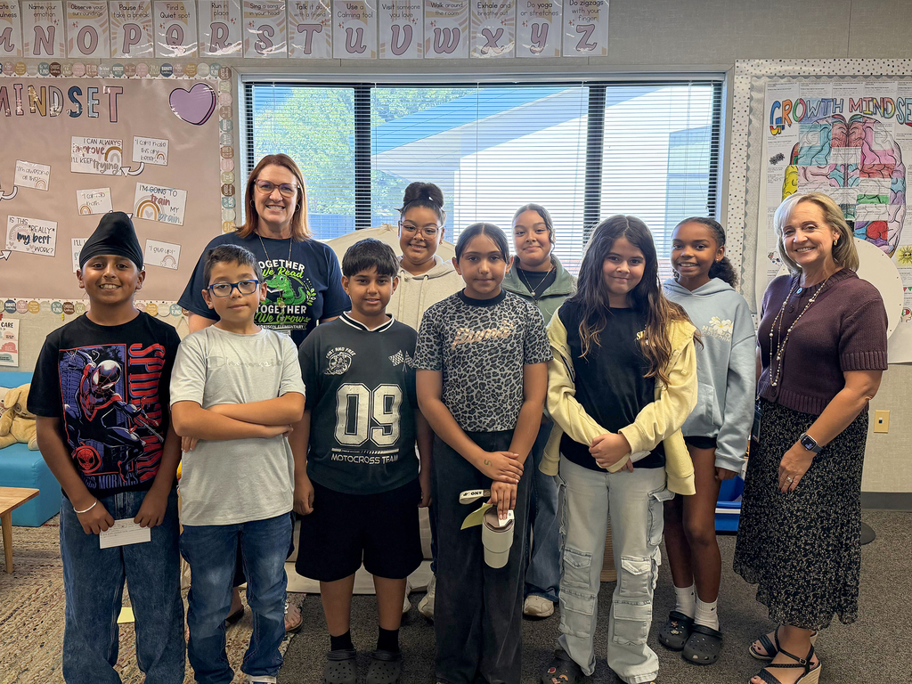 Students with Dr. Peterman and Principal Stephanie Pimentel
