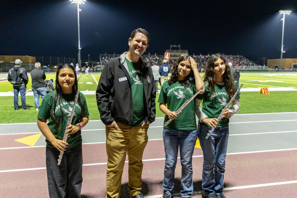 staff and students smiling