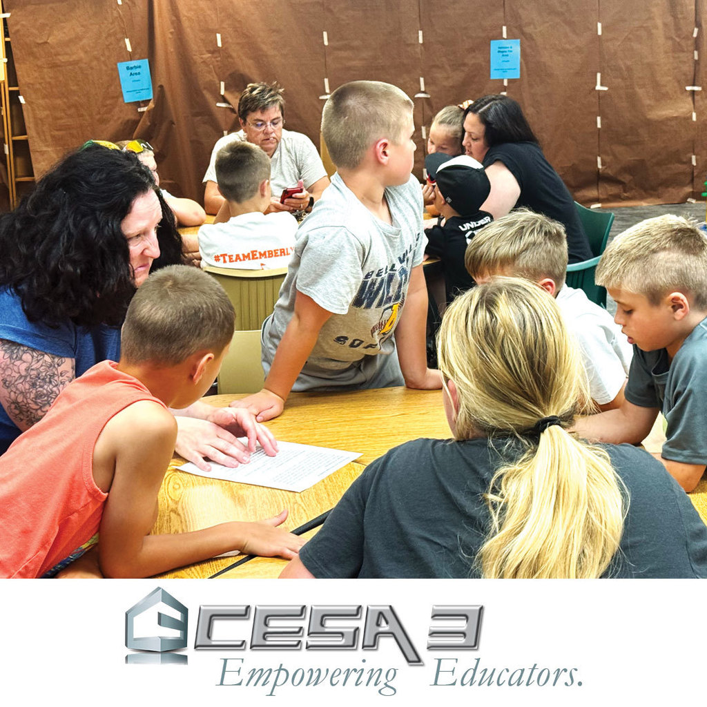 Niki Smith from CESA 3 working with students at Blanchardville Public Library
