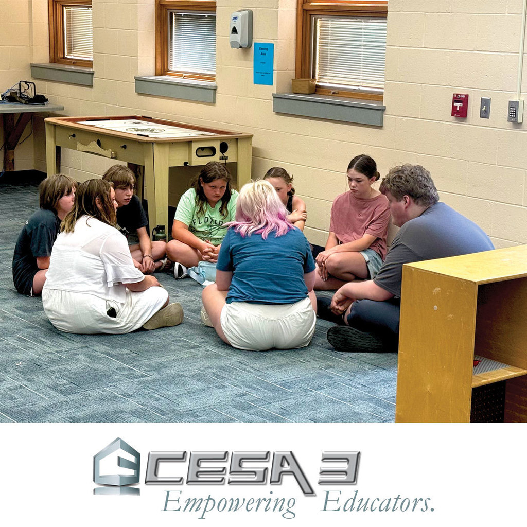 Niki Smith from CESA 3 working with students at Blanchardville Public Library
