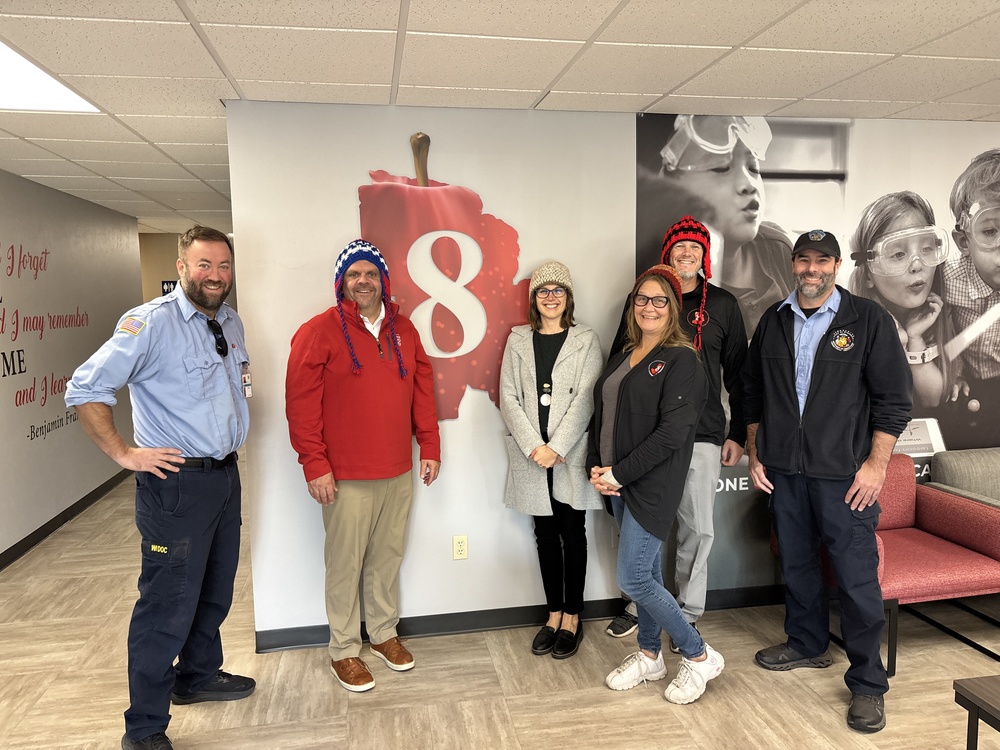 CESA 8 staff models hats donated by GBCI