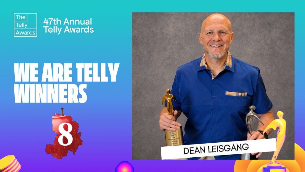 Dean Leisgang holding Telly Awards