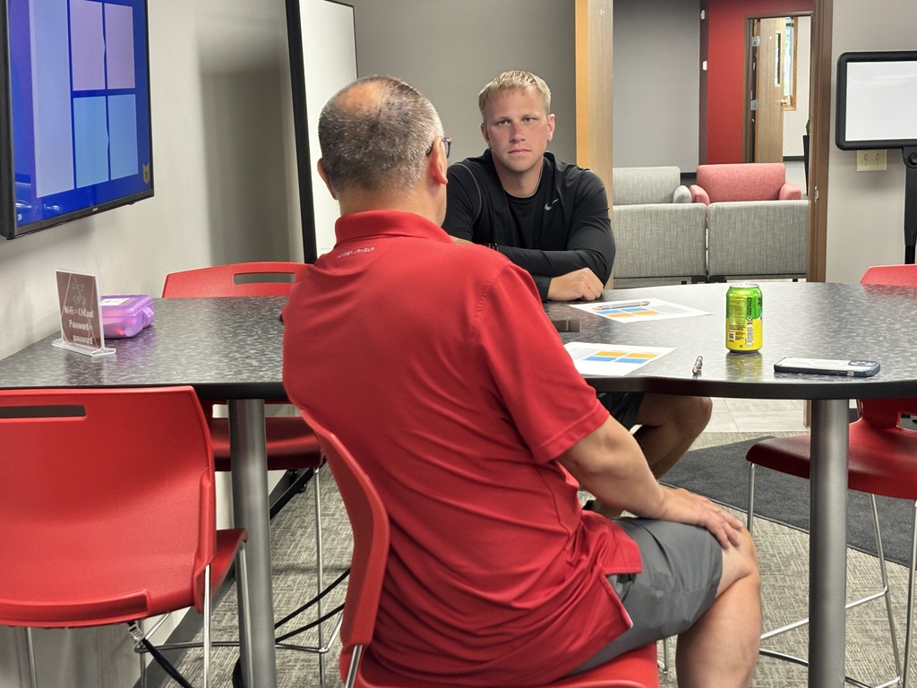 Group of coaches attending the Positive Impact Playbook workshop.