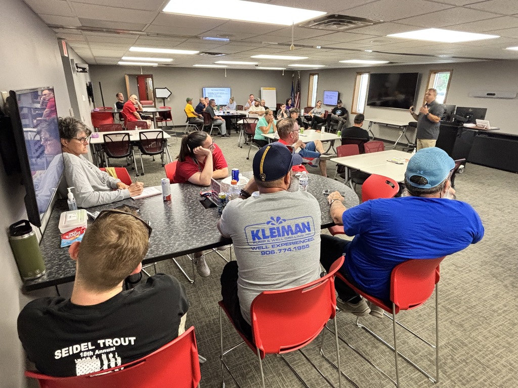 Group of coaches attending the Positive Impact Playbook workshop.