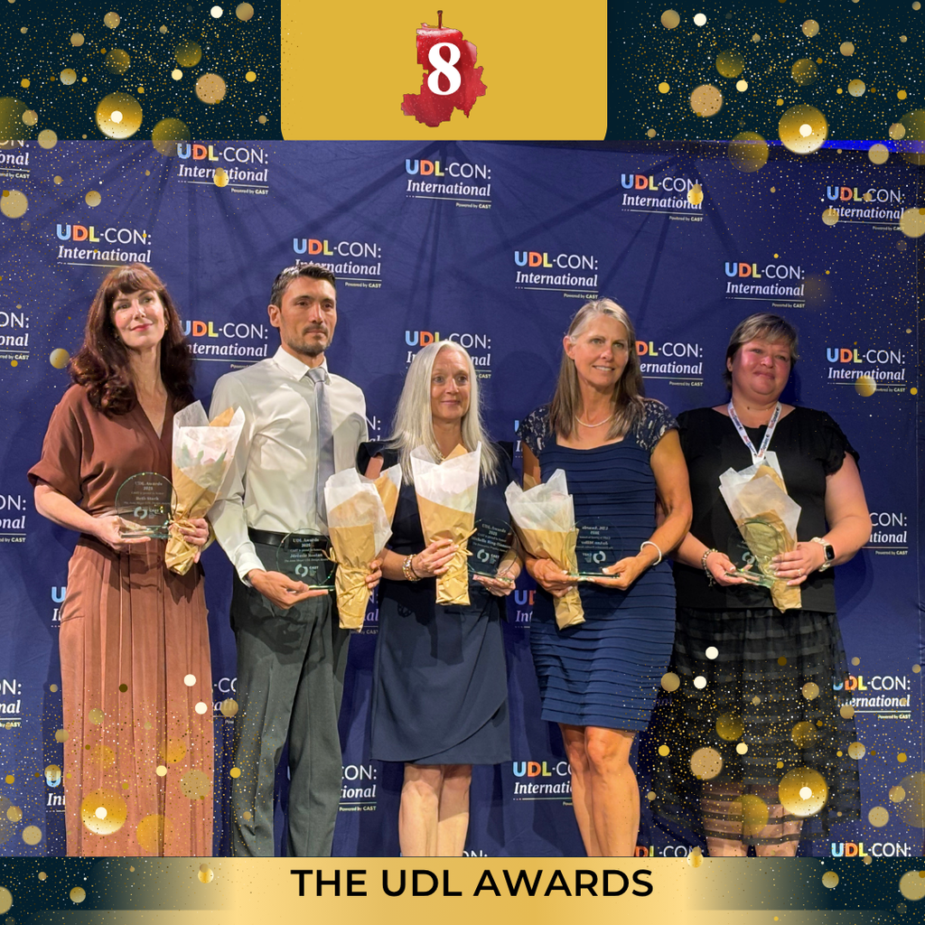 Jo Miller receiving a UDL awards with four others.