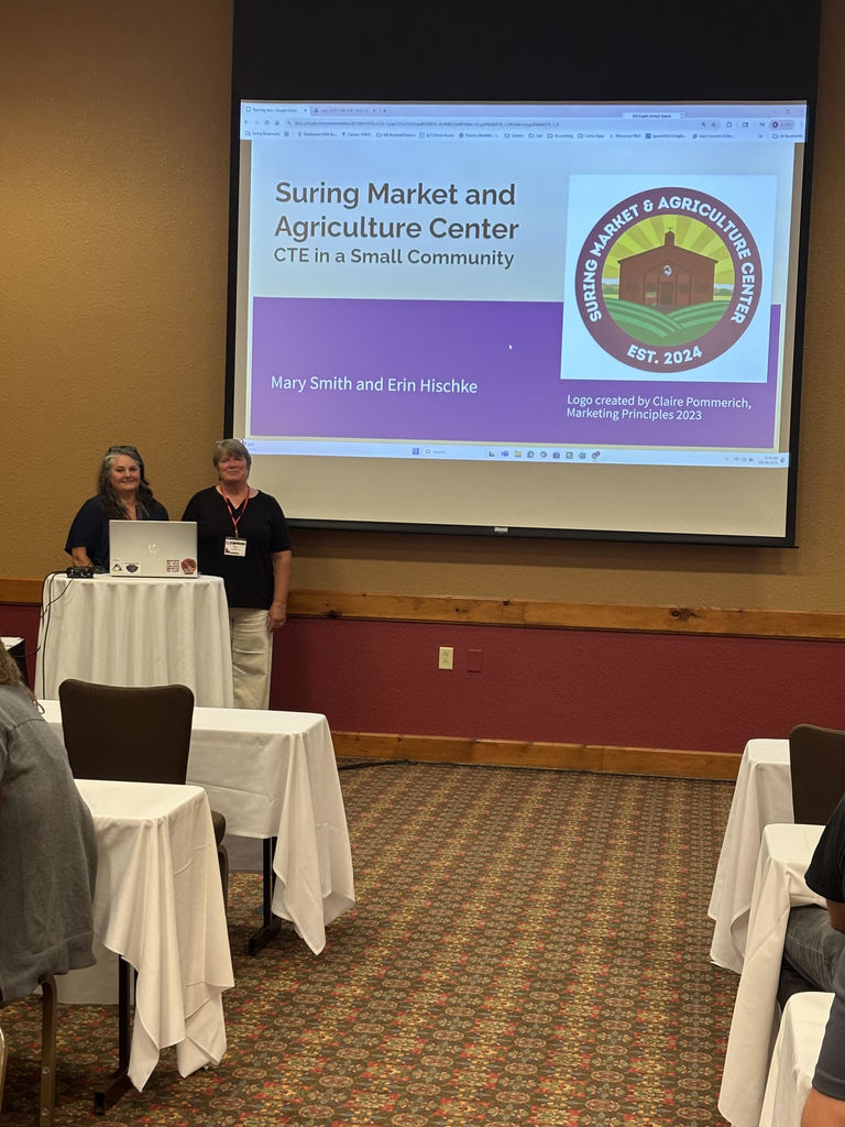 Suring teachers presenting at a workshop.