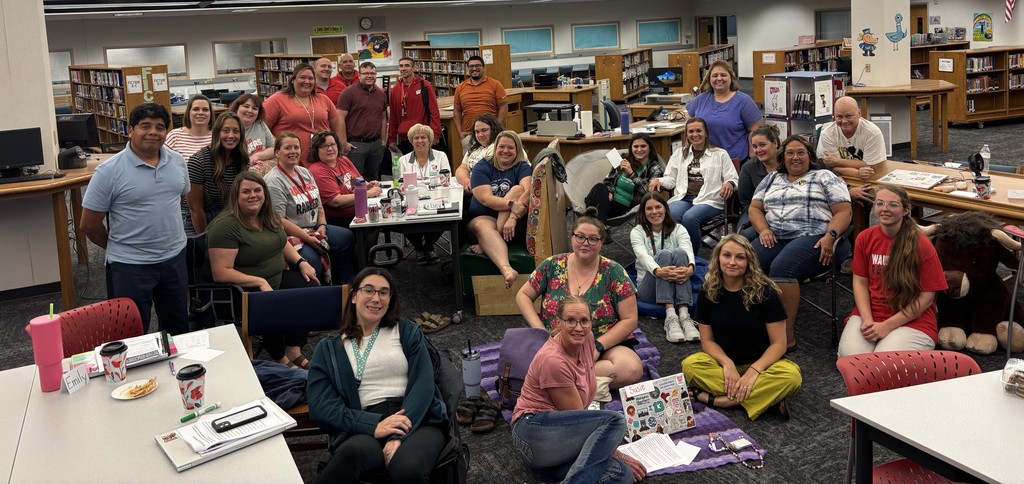 Wausaukee Teachers posing for a picture in the school library.