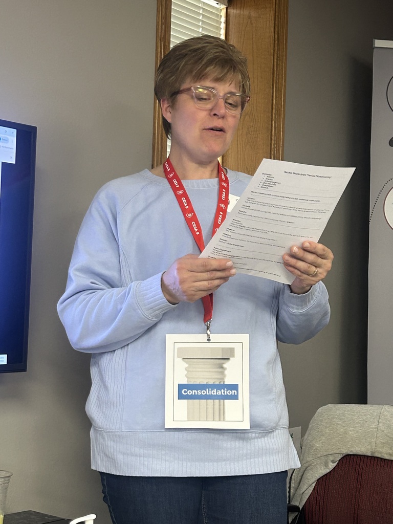 Elementary teacher networking small group work at CESA 8.