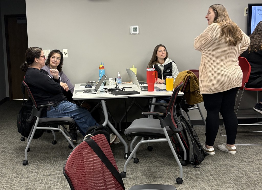 Speech Pathologists work on a table top exercise.