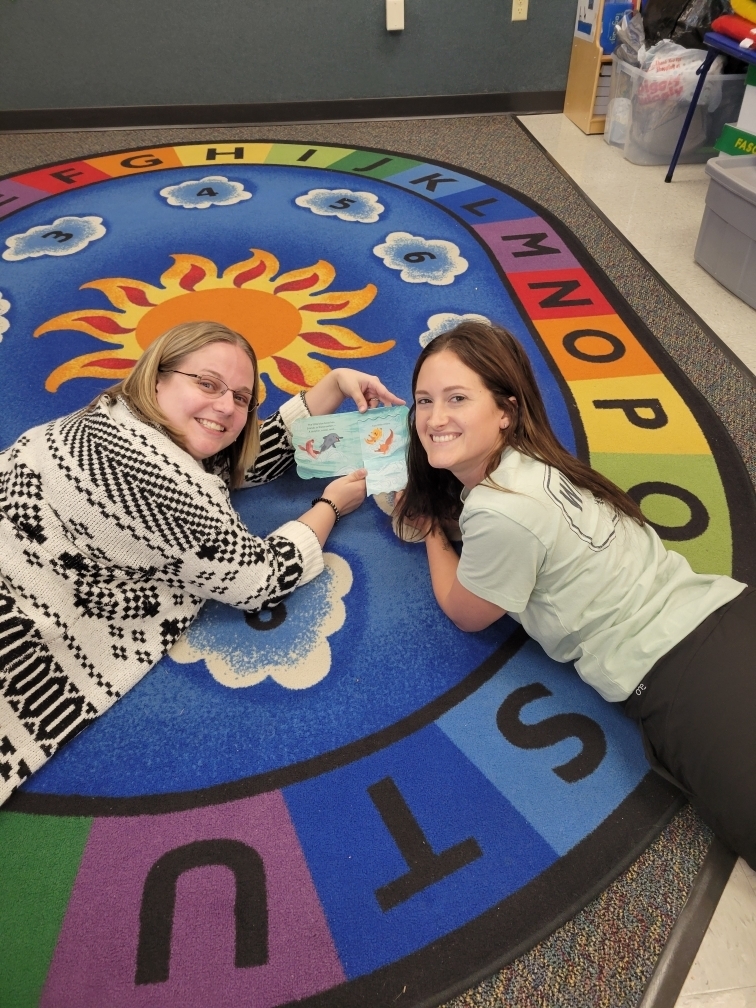 Kaitie Gueths, Speech-Language Pathologist, and Tori Bushmaker, Occupational Therapist, working together.