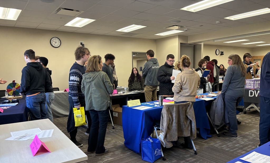 Students and educators talk at a Transition Fair.