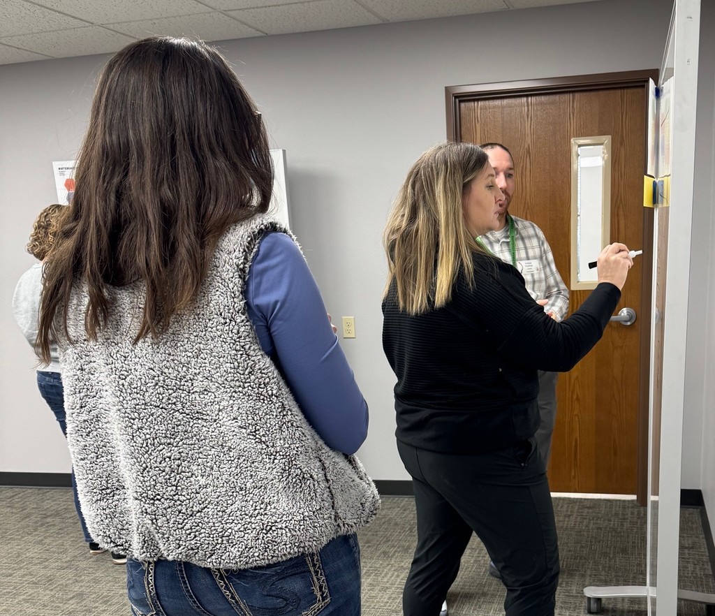 CESA 8 Math Network Grades 6–12 meeting, teachers working at whiteboards.