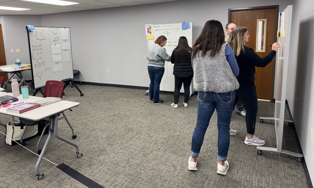 CESA 8 Math Network Grades 6–12 meeting, teachers working at whiteboards.