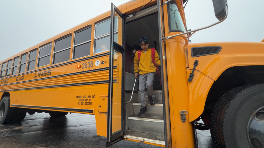 Wausaukee student getting off the school bus
