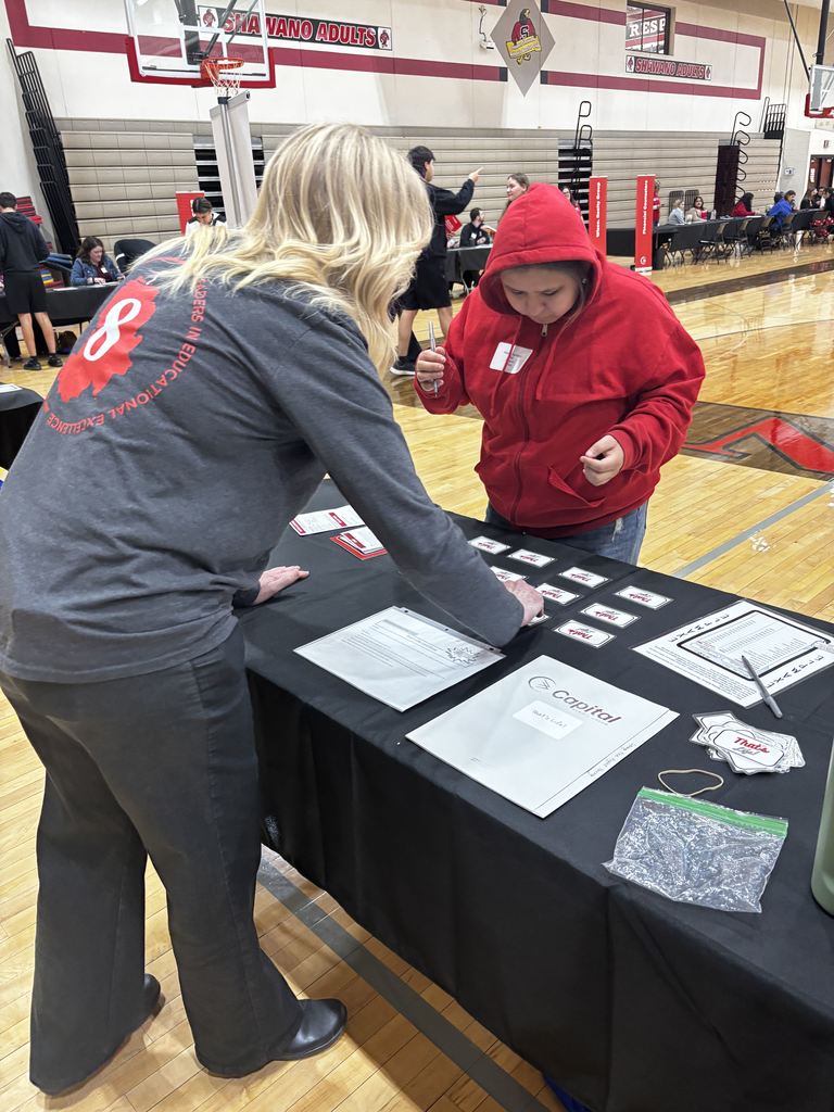 Students participating in a reality fair.