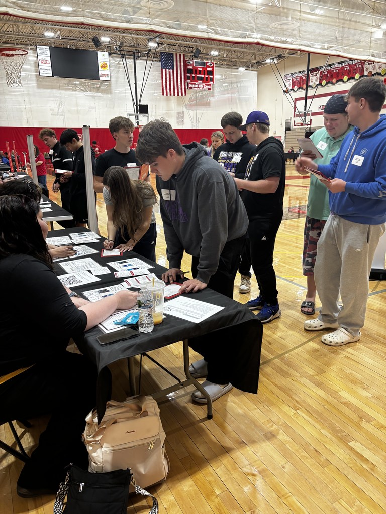 Students participating in a reality fair.