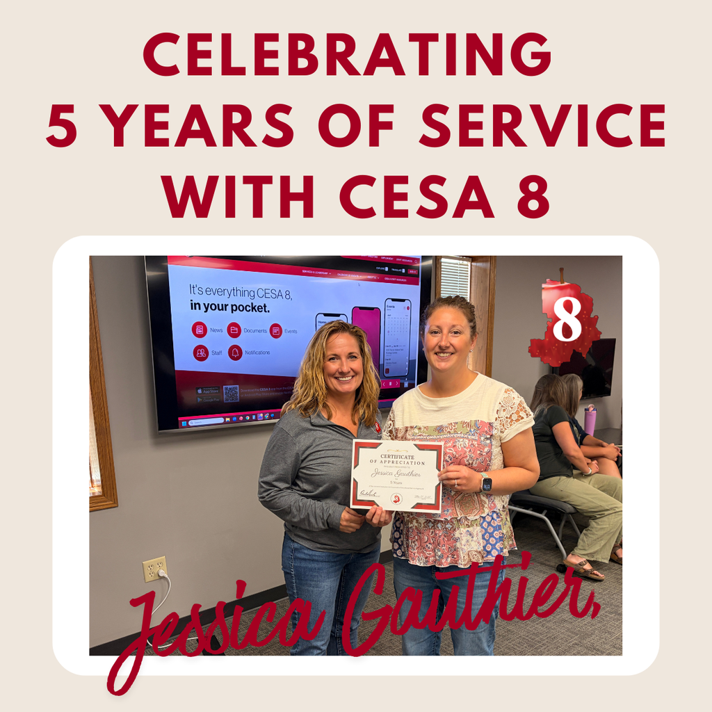Jessica Gauthier holding up an anniversary certificate