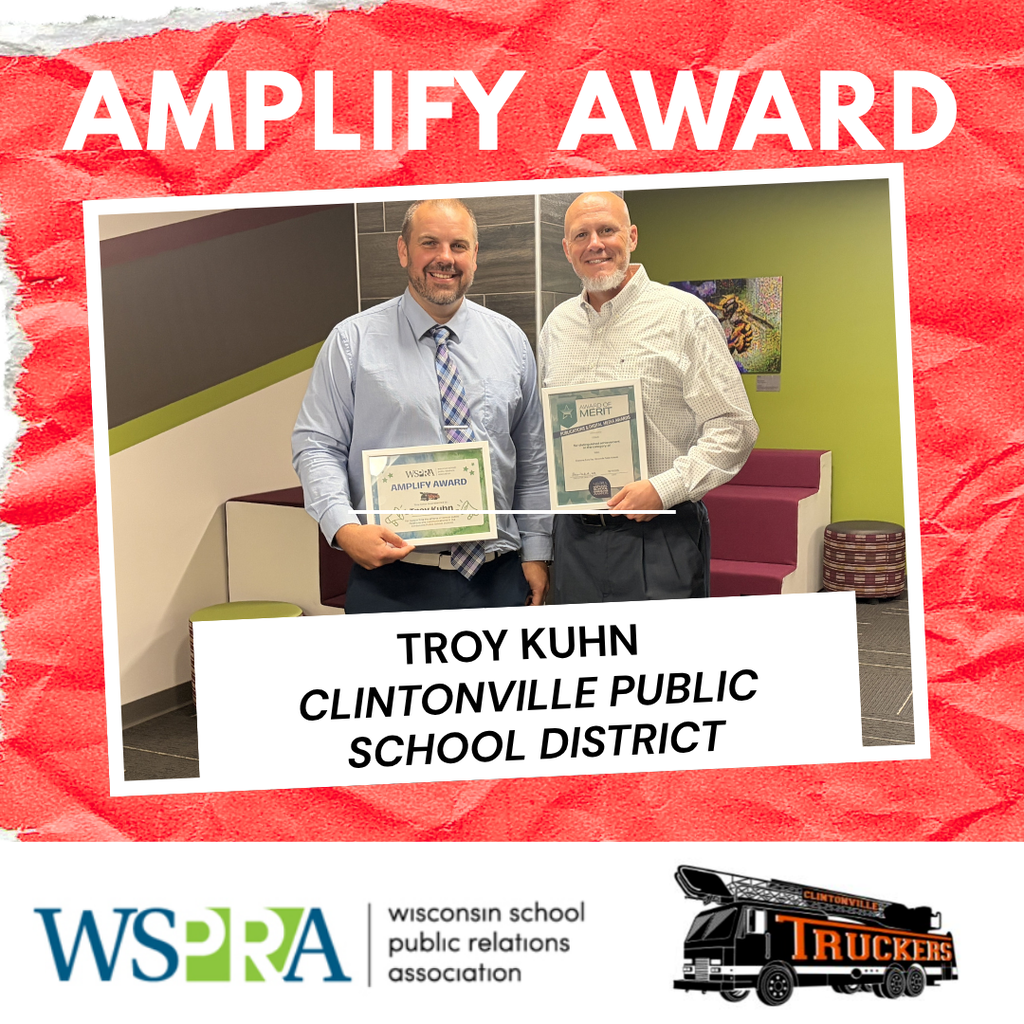 Dean Leisgang presents Troy Kuhn with an award.