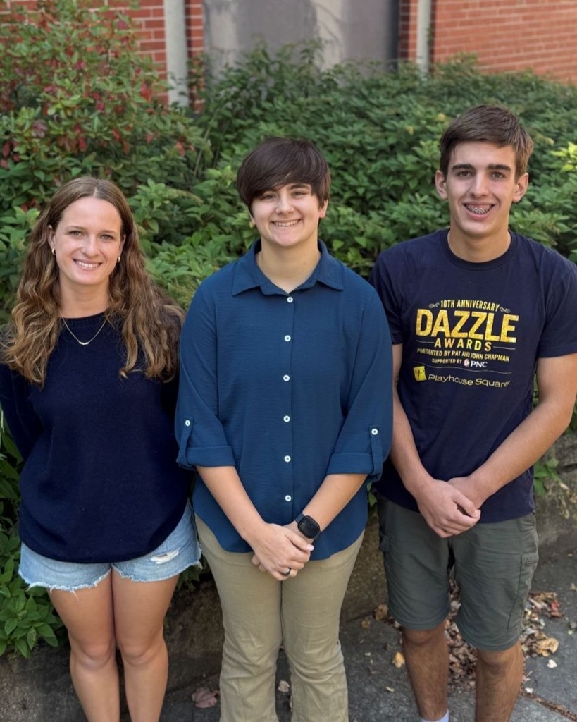 Chagrin Falls National merit semi-finalists in front of the school together.