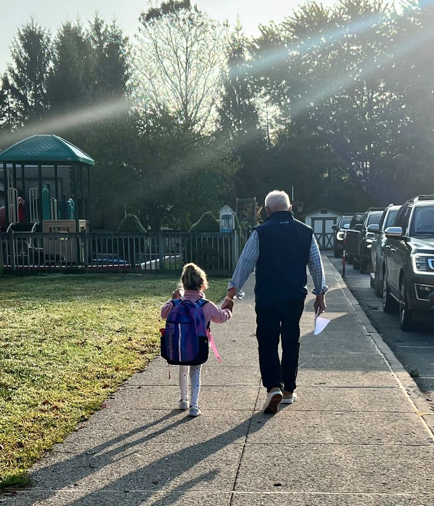 Gurney love grandparents day, students coloring and sharing a snack with loved ones.