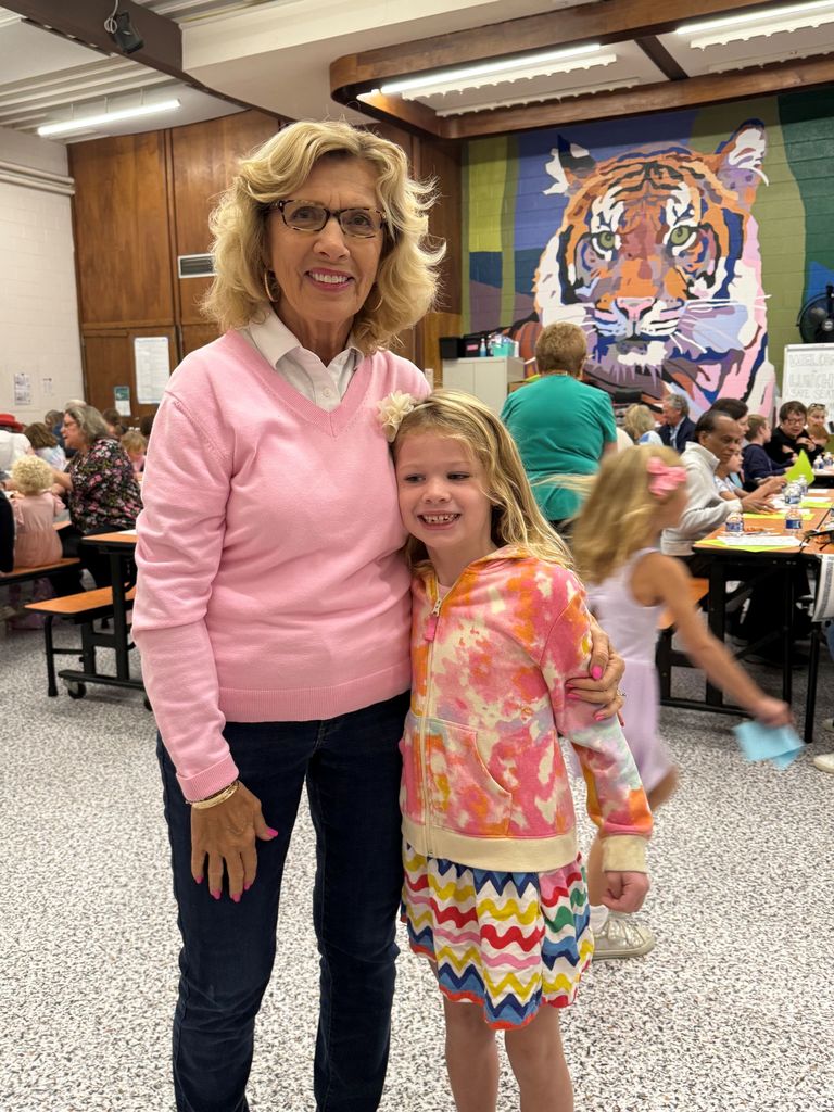 Gurney love grandparents day, students coloring and sharing a snack with loved ones.