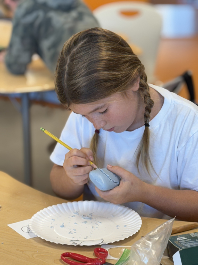 4th grade students carve soap as part of their ELA class to share an experience with the main character.