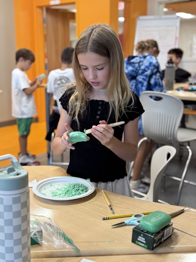 4th grade students carve soap as part of their ELA class to share an experience with the main character.