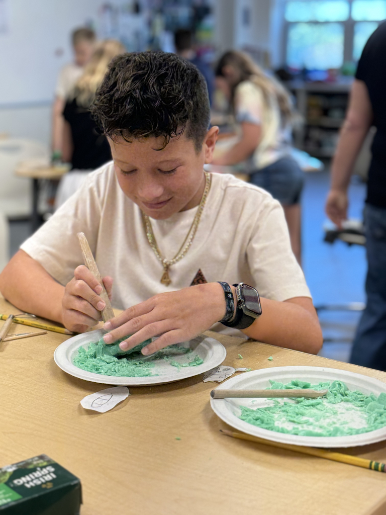 4th grade students carve soap as part of their ELA class to share an experience with the main character.