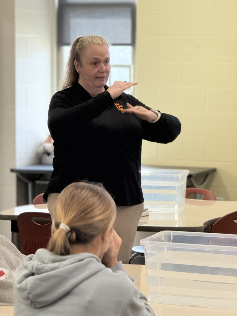 Using hot glue, students experimented with items like beads, hardware, popsicle sticks, and balloons to adjust balance and achieve neutral buoyancy.