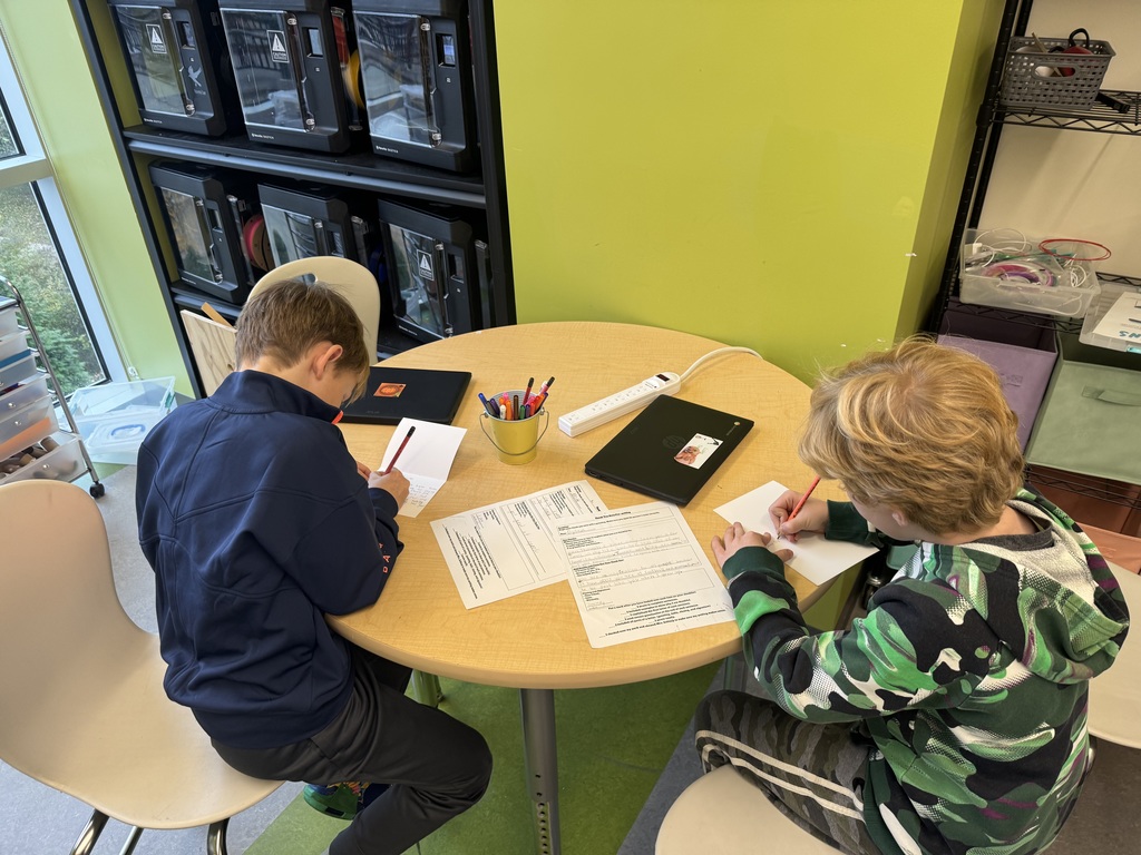 Innovation students writing thank you cards to those who help them.