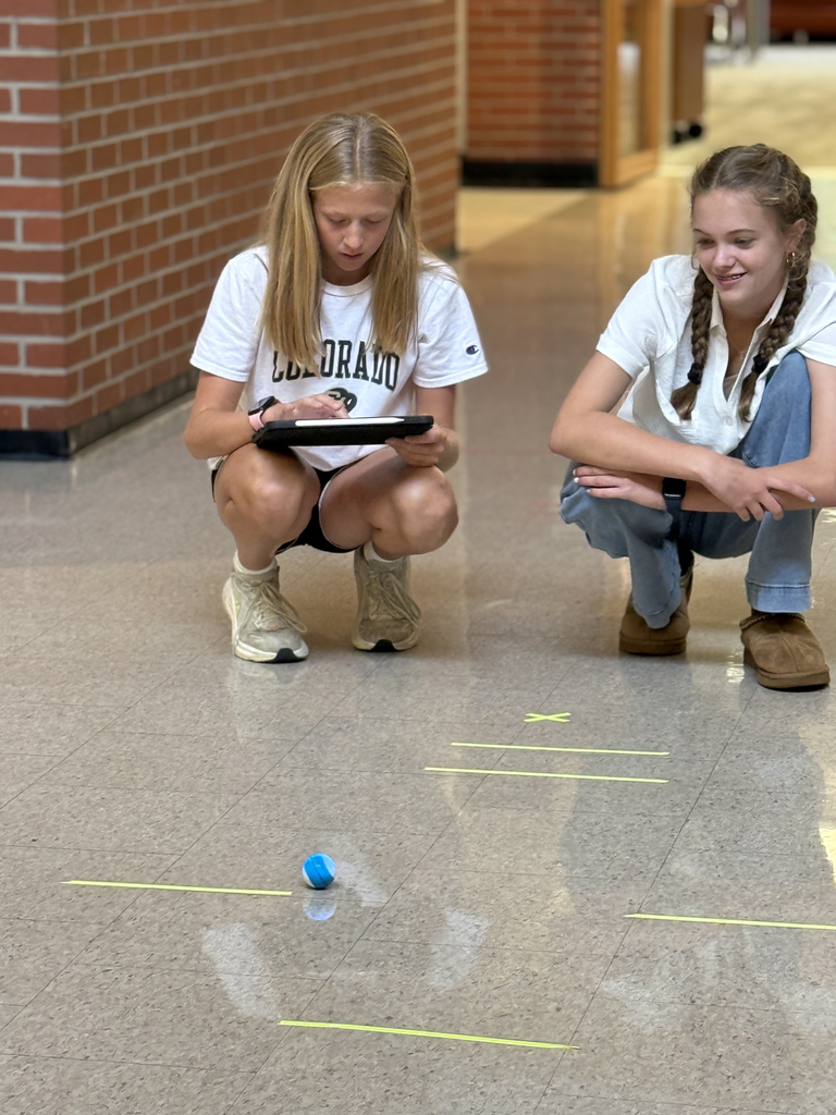 8th grade students program Spheros Robots for croquet course.