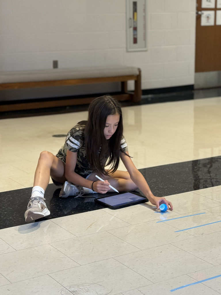 8th grade students program Spheros Robots for croquet course.