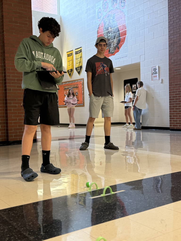 8th grade students program Spheros Robots for croquet course.