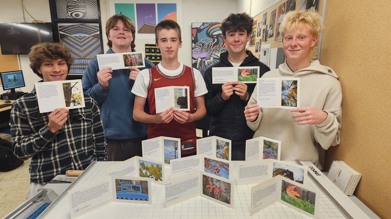 Students working together to assemble bags to give to those in need.