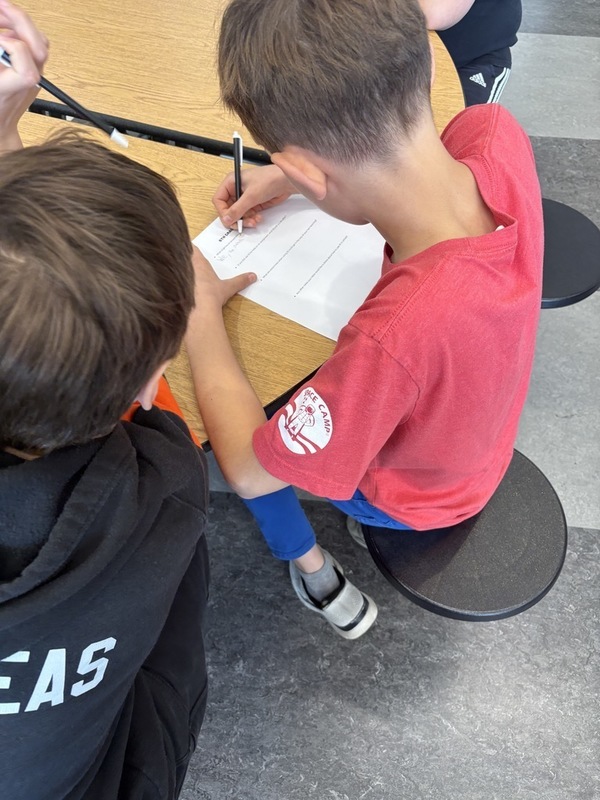 Students engaging in learning about AI with ELA, Tech Coach and School counselor. 