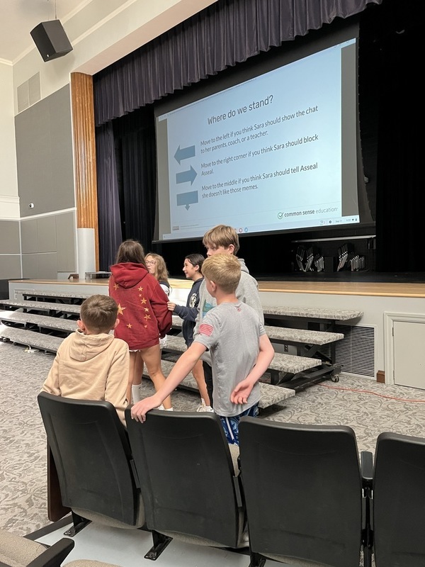 Students engaging in learning about AI with ELA, Tech Coach and School counselor. 