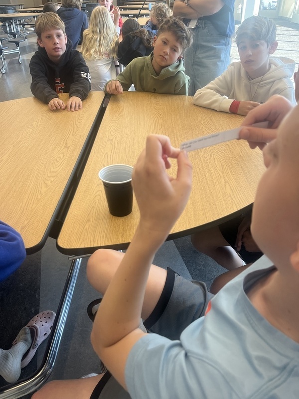 Students engaging in learning about AI with ELA, Tech Coach and School counselor. 