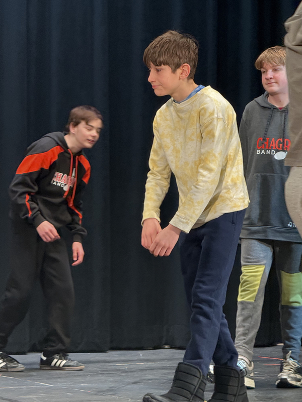 6th grade students participating in a great lakes theater residency. playing theater games to warmup. 