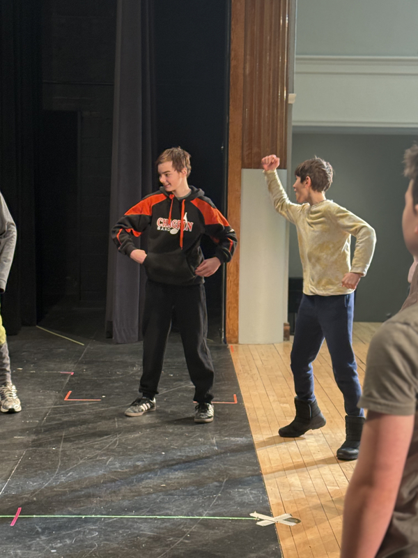 6th grade students participating in a great lakes theater residency. playing theater games to warmup. 