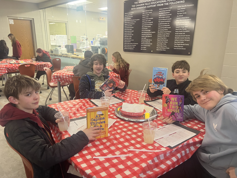 Students reading books at the CFMS IC Cafe.