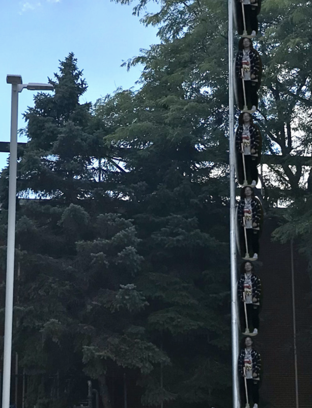 Students in Chagrin Falls High School’s MMR course estimated the height of the flagpole in front of the school.  MMR student Samantha Brownell took a photo of teammate Tamara Birola Castillo beside it and edited the photo to stack her up several times next to the pole. They multiplied Tamara's height by the number of Tamara's in the tower to find a solution.