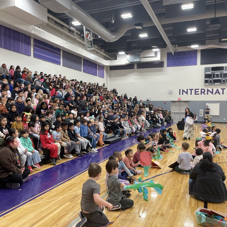 parents watching IPA’s NAAPID assembly with students seated in front