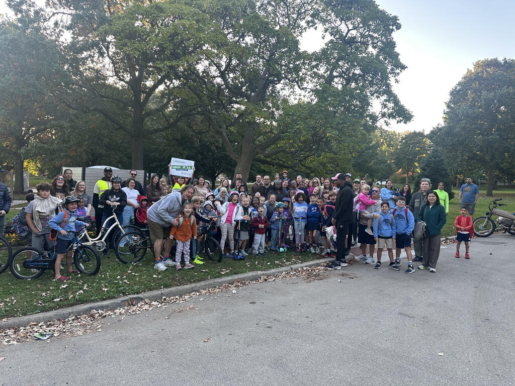 Westview Elementary School students walk and roll to school to encourage people to walk and bike to school.