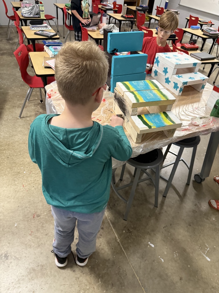 6th grade students build and paint step stools in Mr. Scharf's CTE class!!