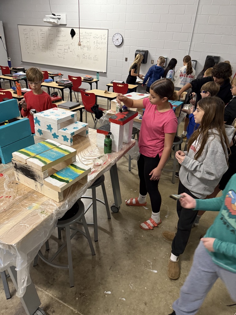 6th grade students build and paint step stools in Mr. Scharf's CTE class!!