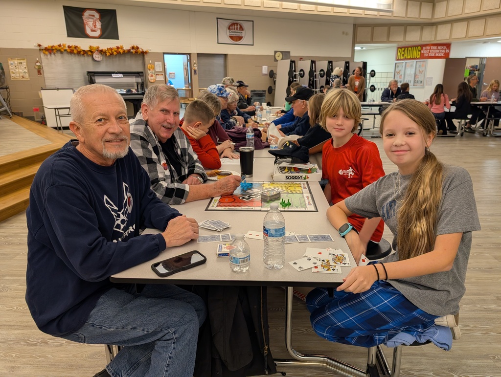veterans and students playing a game